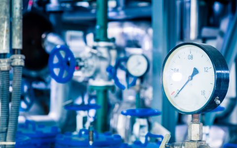steel pipelines and cables in a plant,Industrial zone.